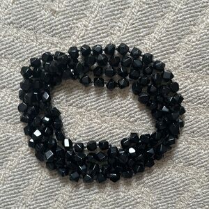 Black beaded strand